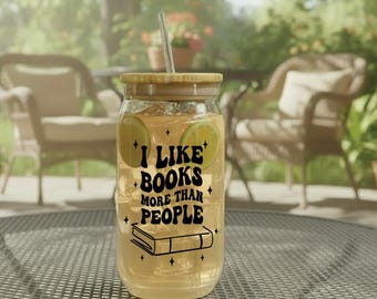 Me gustan más los libros que las personas. Taza de café de cristal transparente.