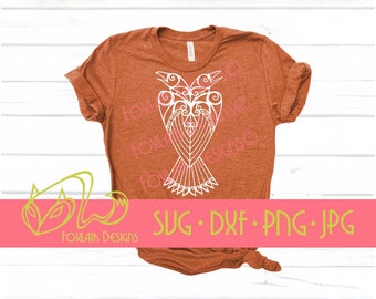 May include: A rust-colored t-shirt with a white design of two stylized birds facing each other. The text "SVG - DXF - PNG - JPG" is printed on the bottom of the shirt.