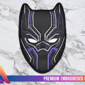 May include: Black embroidered patch of the Black Panther mask with purple and gray details. The patch has a "PREMIUM EMBROIDERED PATCH" label at the bottom.