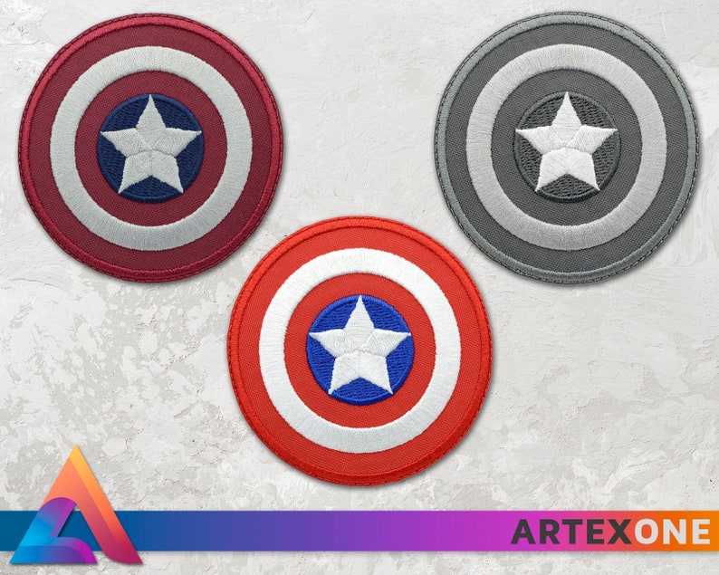 May include: Three embroidered patches featuring a red, white, and blue circle with a white star in the center, a gray circle with a white star in the center, and a white circle with a blue star in the center.