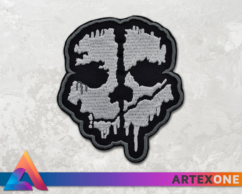May include: A black and white embroidered patch featuring a skull with a dripping effect. The skull is outlined in black and the details are in white.