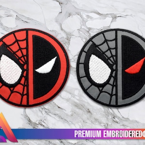 Op de afbeelding: Twee geborduurde patches, een rood en zwart met een spinnenwebontwerp en de andere grijs en zwart met een spinnenwebontwerp. Beide patches hebben een wit oog en een rood oog aan elke kant.