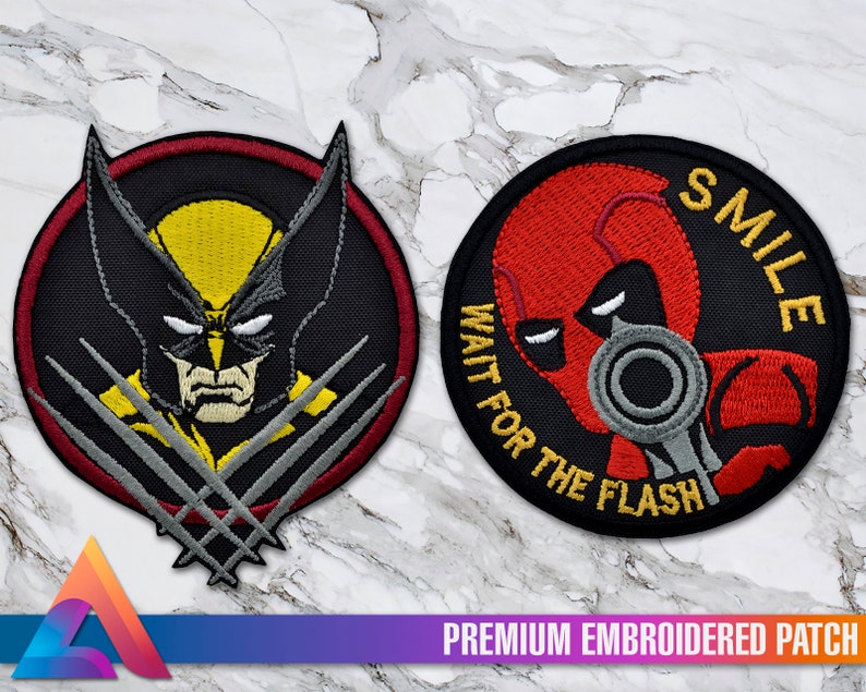 May include: Two embroidered patches, one featuring Wolverine with his claws and the other featuring Deadpool with the text "Smile Wait for the Flash".
