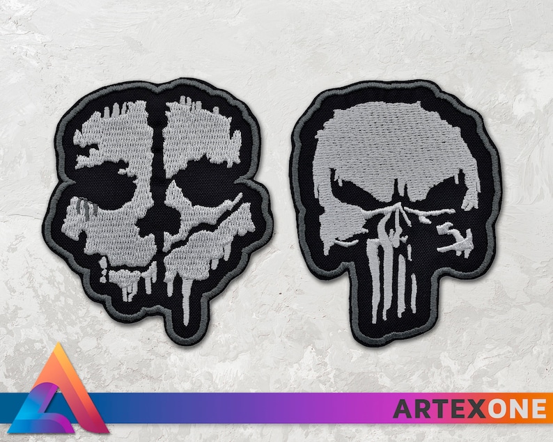 May include: Two embroidered iron-on patches featuring skull designs. The first patch is a grey skull with dripping details on a black background. The second patch is a grey skull with a white outline on a black background.