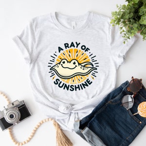 A Ray of Sunshine Cute Stingray Shirt | Surfer Shirt | Ocean Lover Gift |  Unisex Jersey T-shirt
