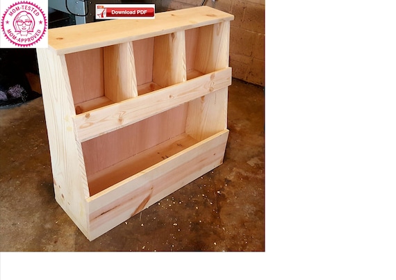 wooden toy shelf with bins