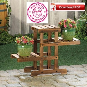 May include: A wooden plant stand with three tiers, each tier has a brown wooden shelf. The stand is in a garden setting with green grass and brick pavers. There are three potted plants on the stand, two with pink flowers and one with green leaves. The stand is labeled "Mom-Tested, Mom-Approved" and "Download PDF".