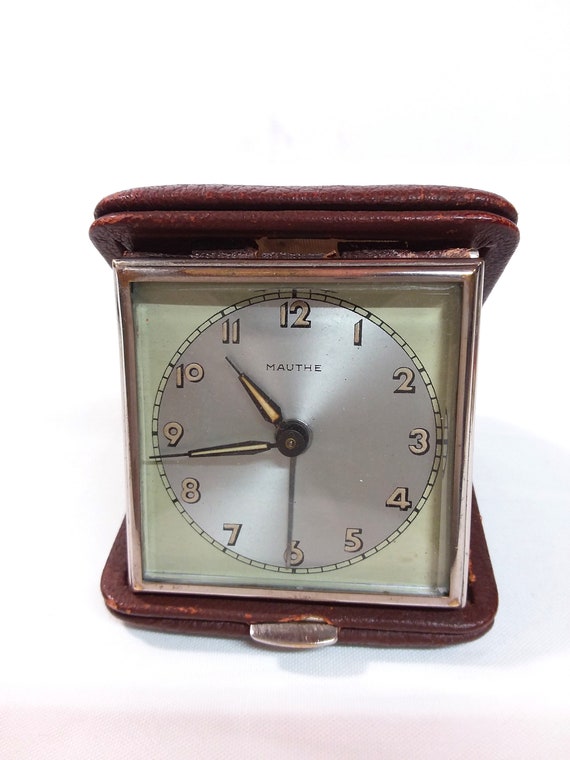 Sveglia da viaggio Mauthe, orologio vintage pieghevole color oro  perfettamente funzionante. Orologio da mensola o da camera. -  Italia