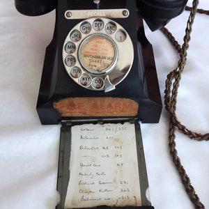 Bakelite black Telephone, vintage 1950s dial phone. Original features, turn dial and drawer, all in great order. Not converted.
