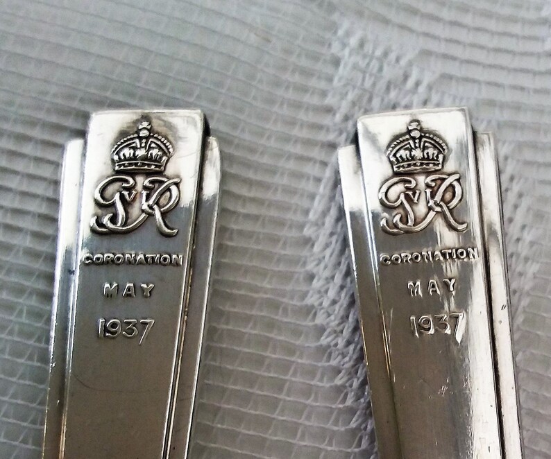 Wedding gift. 2 x vintage silver spoons Commemorative spoons George V Coronation May 1937 in Cereta plate