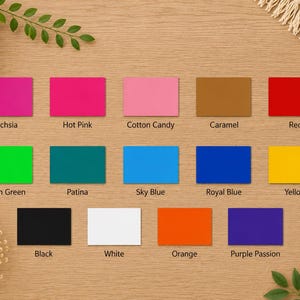 May include: A color chart featuring thirteen rectangular swatches labeled Fuchsia, Hot Pink, Cotton Candy, Caramel, Red, Neon Green, Patina, Sky Blue, Royal Blue, Yellow, Black, White, Orange, and Purple Passion arranged in three rows.