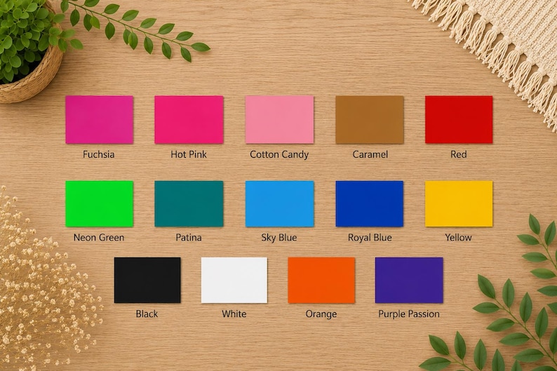 May include: A color chart featuring thirteen rectangular swatches labeled Fuchsia, Hot Pink, Cotton Candy, Caramel, Red, Neon Green, Patina, Sky Blue, Royal Blue, Yellow, Black, White, Orange, and Purple Passion arranged in three rows.