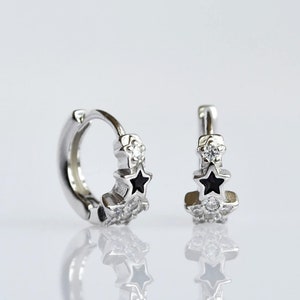 Star huggie hoop earrings. Small sterling silver celestial hoop earrings. Tiny cubic zirconia cartilage hoop earrings