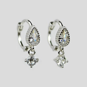 Sterling silver cartilage hoop earrings. Tiny huggie hoop earrings. Dainty cubic zirconia charm hoop earrings. Mini helix hoop