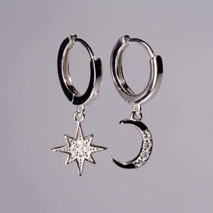 Small huggie hoop earrings. Sterling silver mismatched moon and star earrings. Minimalist gold star hoop earrings. Funky hoop earrings