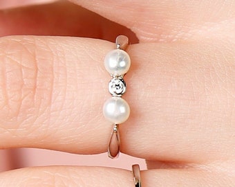 Dainty freshwater pearl engagement wedding ring. Sterling silver raw stone birthstone ring. Adjust thin stacking ring. Cubic zirconia ring