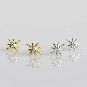 Sterling silver star stud earrings. Tiny gold star earrings. Minimalist cartilage earring. Dainty cubic zirconia earrings