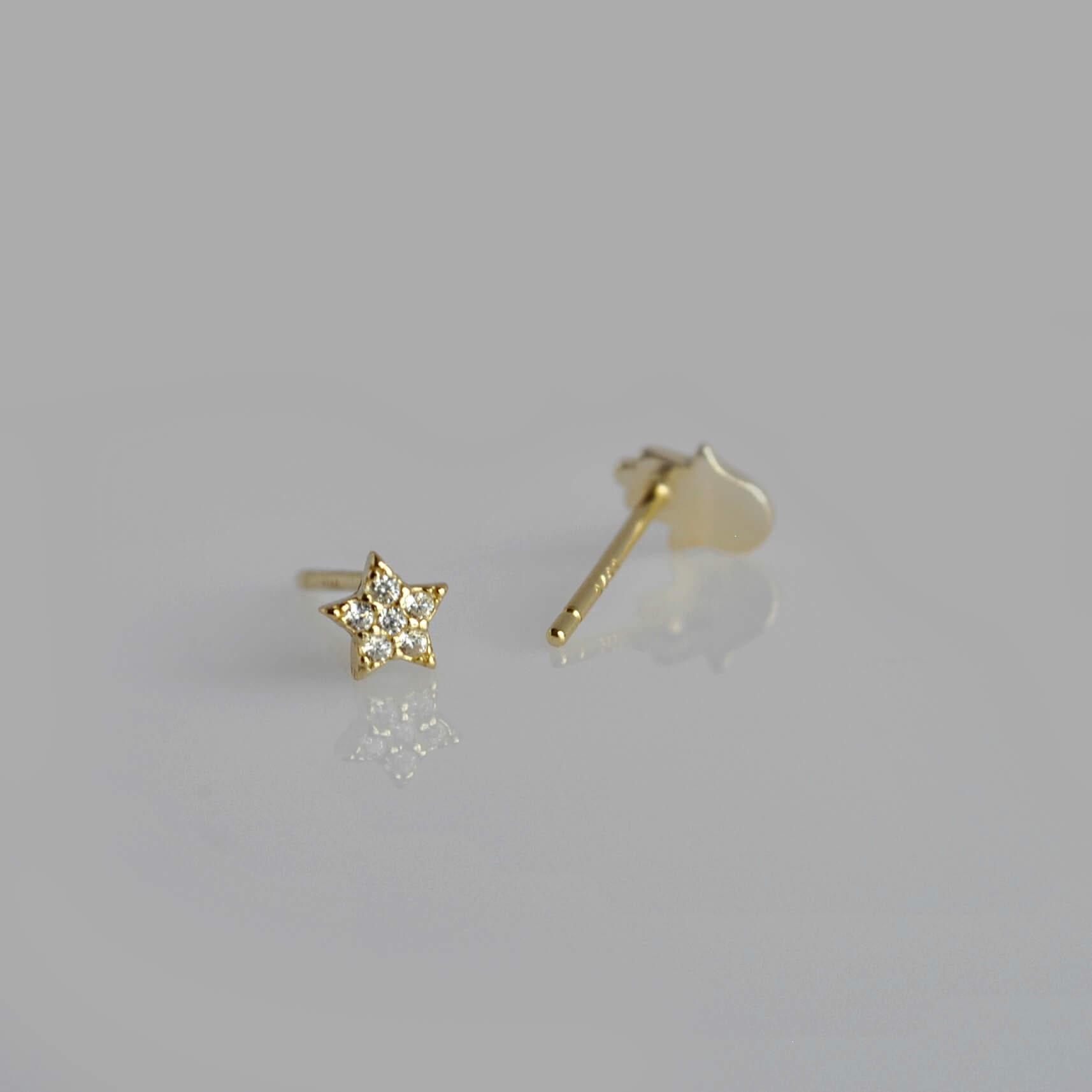 Mismatched gold star and hand earrings Tiny sterling silver | Etsy