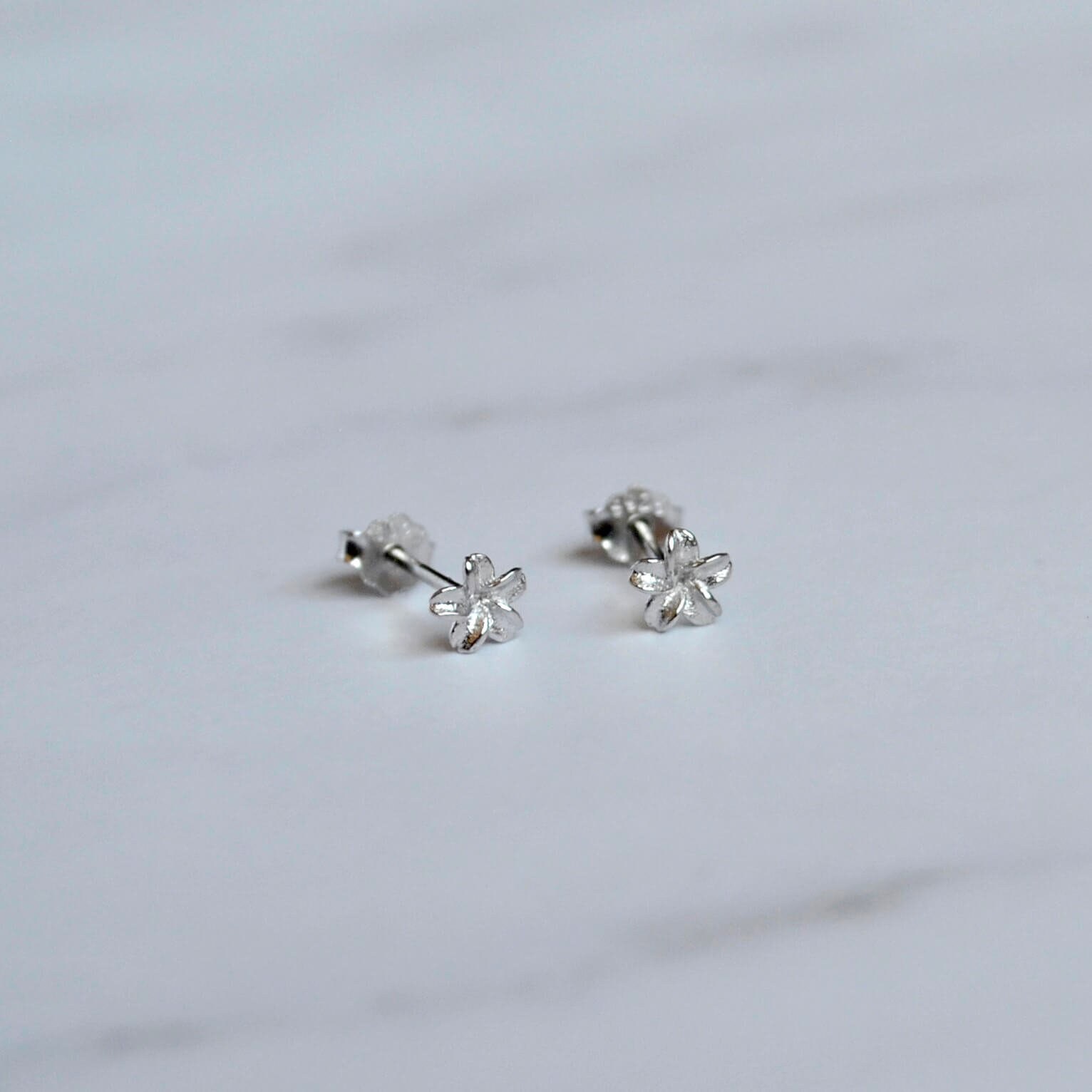 Tiny silver flower stud earrings. Small sterling silver | Etsy