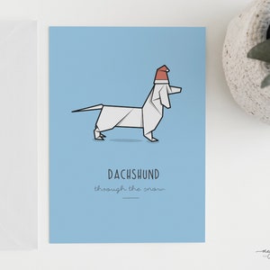 de voeux de Noël en origami teckel de Zazzle.be Liste d'envies Vous avez des idées ? de fête pour chien de Noël | Teckel dans la neige | Format A6 + enveloppe | Blanc à l'intérieur