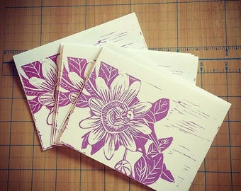 Romantic card with original block print of a passionflower