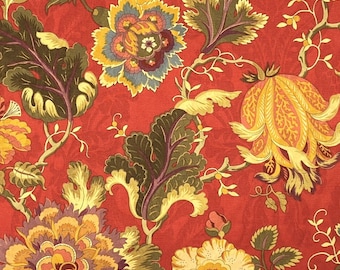 May include: Red fabric with a floral pattern featuring yellow, green, and purple flowers. The flowers are stylized and have a vintage look.