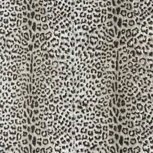 May include: A close-up of a fabric with a white background and a black leopard print pattern.