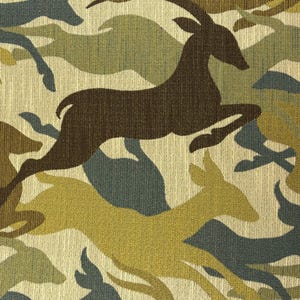 May include: A woven fabric featuring a repeating pattern of leaping deer silhouettes in dark brown and mustard yellow. The background consists of abstract, organic shapes in shades of slate blue, olive green, and cream, creating a textured appearance.