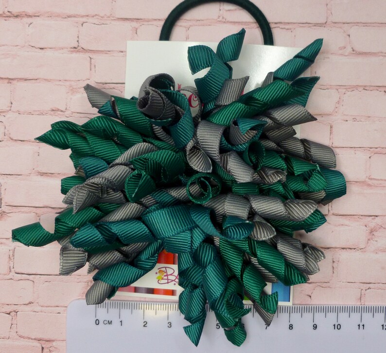 pair 3 inch Hunter green and Grey Corkers on Elastics