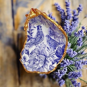 Decoupage Oyster Shell (various designs) edged with copper paint and drilled with hanging organic twine