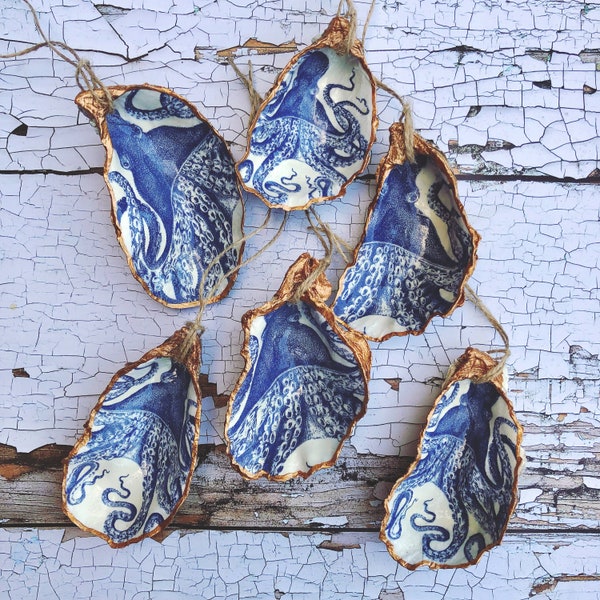 Decoupage Oyster Shell (various designs) edged with copper paint and drilled with hanging organic twine