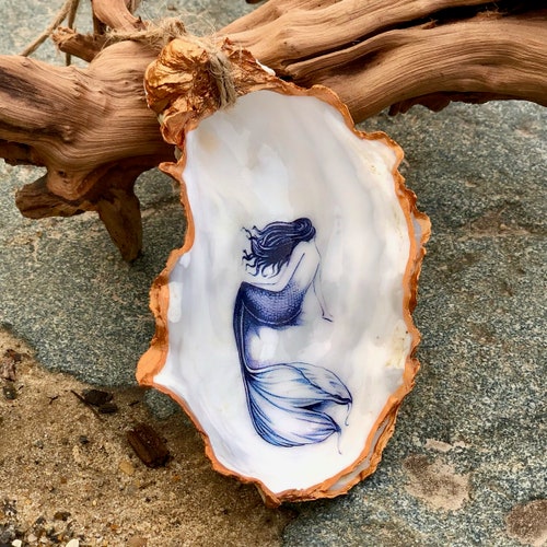 Handcrafted Mermaid Oyster Shell (various designs) sealed with gloss varnish, drilled and hung with organic twine. coastal decor