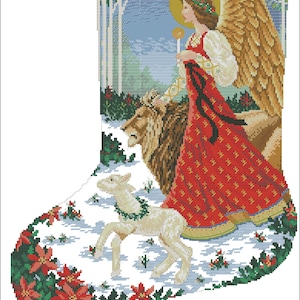 May include: A Christmas stocking with a white background featuring an angel with golden wings and a red robe, standing with a lion and a lamb in a snowy forest setting. The stocking has a white border with a red and green trim. The stocking also includes an alphabet in blue.