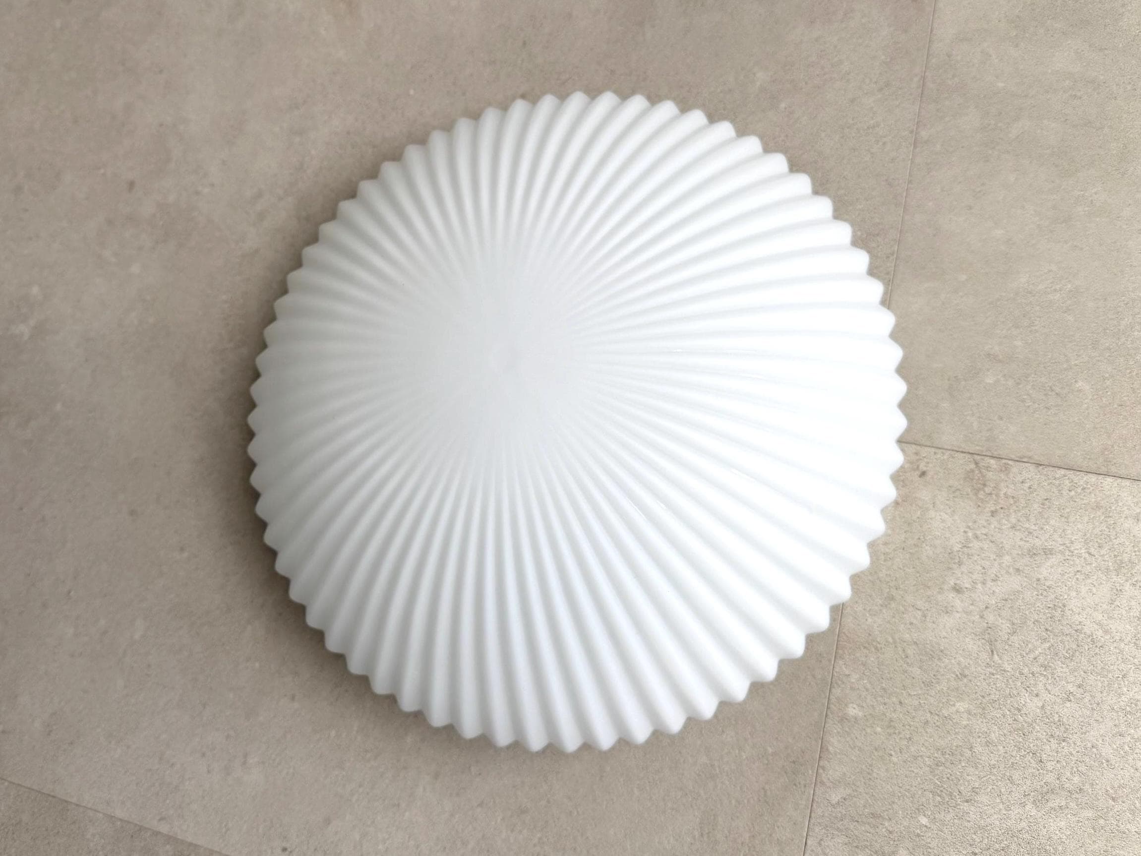 Round vintage white glass ceiling lamp with stripes