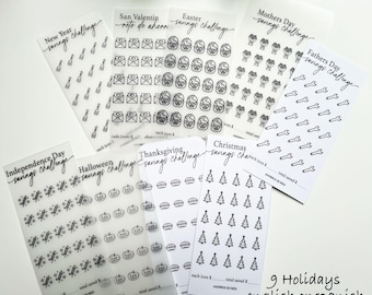 May include: Nine clear plastic savings challenge cards with black line art icons for various holidays, including New Year, Valentine's Day, Easter, Mother's Day, Father's Day, Independence Day, Halloween, Thanksgiving, and Christmas. Text in English and Spanish.