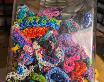 Random assortment of rainbow loom bracelets. Ready to be made into kandi!
