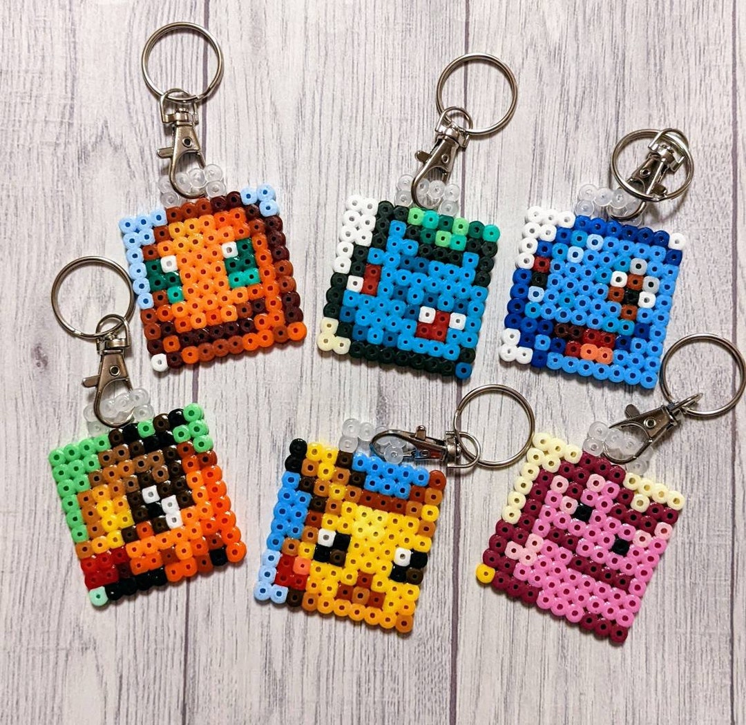 Porte clés en perles hama : pikachu pokemon go : bijoux-de-sac par  lespritcreademary