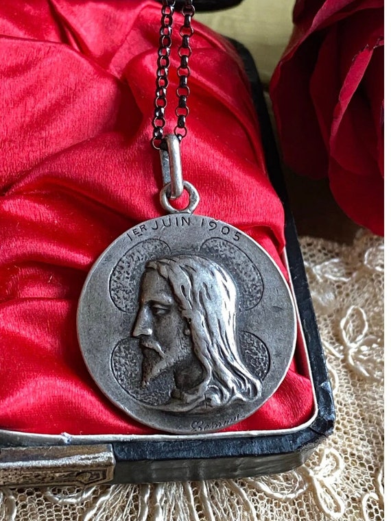 Antique French Jesus Christ medal with Saint Domin