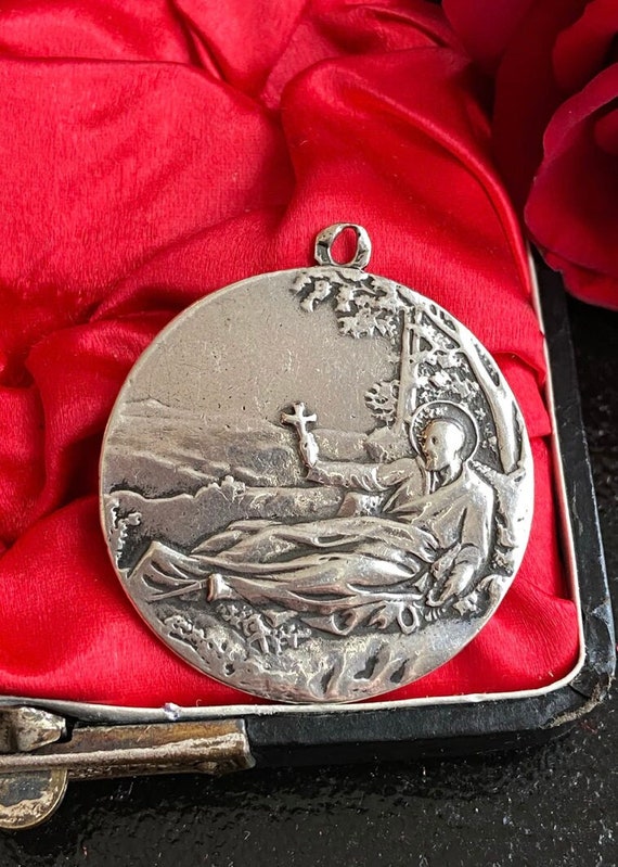 St Francis Xavier Silver Medal