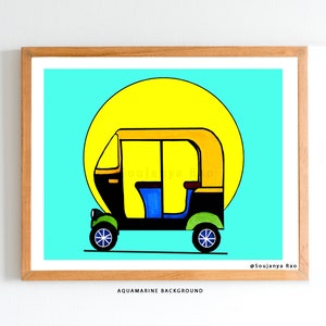 May include: A framed print featuring a colorful illustration of an auto rickshaw, or tuk-tuk, set against a bright aquamarine background. The vehicle is black and yellow with blue seating, and a large yellow sun shape is behind it.
