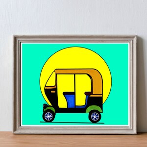 May include: Framed art print featuring a colorful illustration of an auto rickshaw. The vehicle is black, brown, blue, and green, set against a bright turquoise background with a yellow sun. The artwork is in a silver frame.