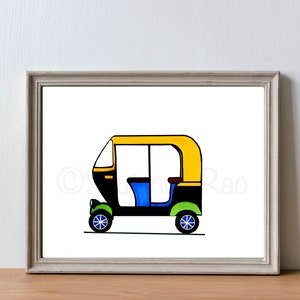 May include: A framed illustration of a colorful auto rickshaw. The vehicle is depicted with a yellow roof, black body, blue seats, and green and blue wheels. The artwork is set against a white background.
