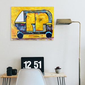 May include: An abstract painting of a yellow and blue auto-rickshaw. The artwork features a yellow background with brushstrokes, and the vehicle is depicted in shades of blue, black, and yellow. The painting is signed by the artist.