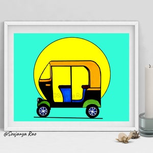 May include: A framed art print featuring a colorful illustration of an auto rickshaw, set against a bright yellow sun and a turquoise background. The auto rickshaw is black, yellow, blue, and green. The artist's name, Soujanya Rao, is in the bottom left corner.