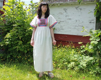 Vintage 1970s Cotton Peasant Dress | Folk Dress | White with Colourful Embroidered Bodice | Empire Waist | Tie Sash | Size Small to Medium