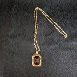 Signed Judy Lee vintage 1960's necklace, with a Red Emerald cut glass stone, Faux Metal gold tone.