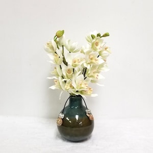 Artificial Cymbidium Orchid Arrangement: Blue/Green Ceramic Vase, Shell Necklace