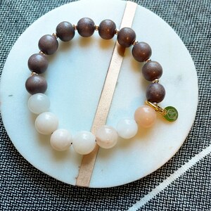 Pink opal stone bracelet: semi-precious stone beads with wood and gold accent beads. image 1