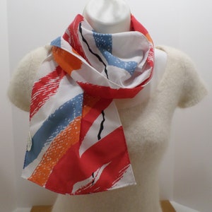 Vintage Women&#39;s Scarf 100% Polyester made in Japan by Avon 53&quot; x 3&quot; White Red Orange Blue Black