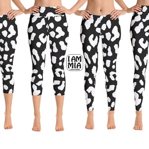 May include: Black leggings with a white spotted pattern. The leggings are shown in multiple views, including capri and full-length styles. The brand logo "I AM MIA" is visible. These leggings are suitable for various activities.